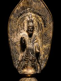 A Gilt Bronze Votive Figure of Standing Buddha
