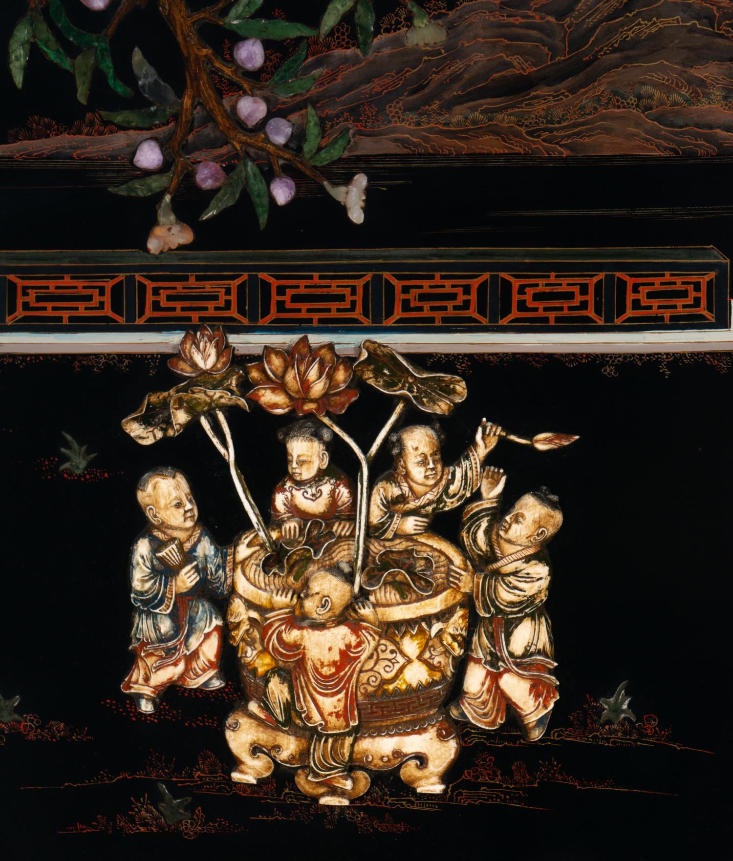 A Chinese Black and Cinnabar Lacquered and Hardstone Inlaid Hanging Screen
