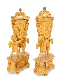 A Pair of Empire Ormolu Vases and Covers
