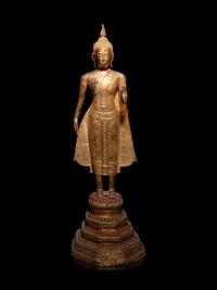 A Thai Gilt Bronze Figure of Standing Buddha