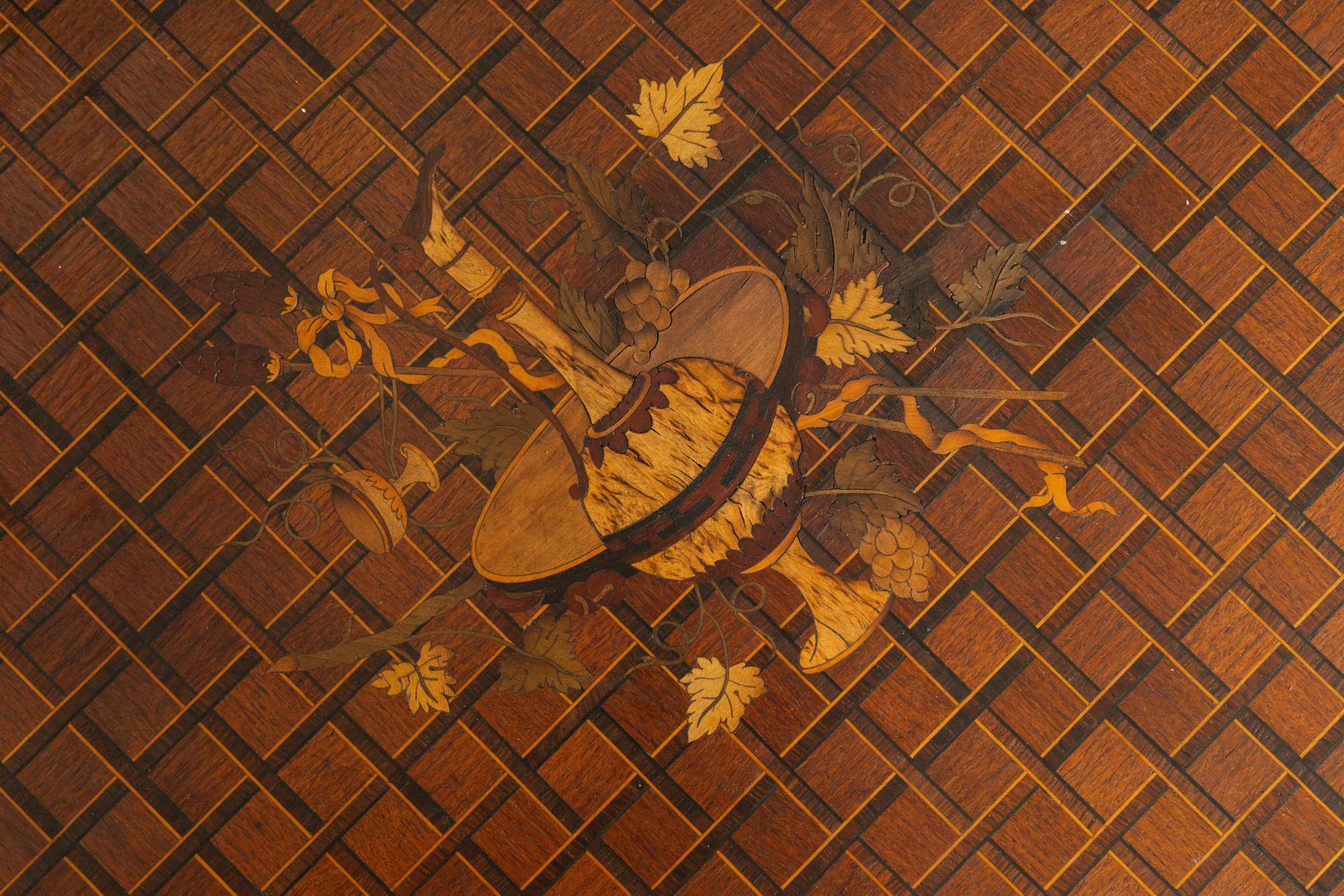 A Transitional Louis XV/XVI Gilt Bronze Mounted Marquetry Writing Table