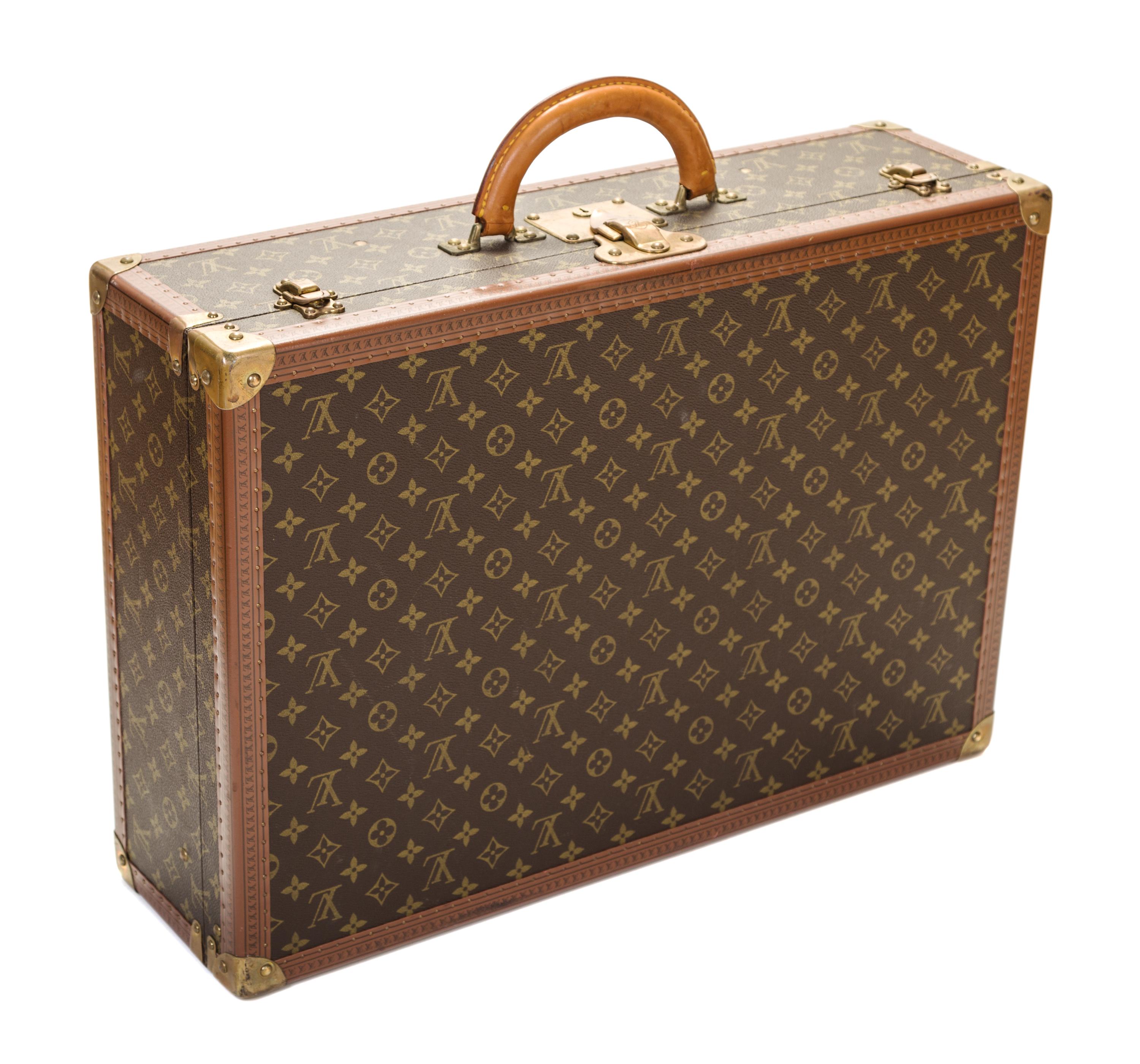 A Louis Vuitton Monogram Canvas Bisten 60 Suitcase, 23.6" x 16.5" x 7.1".