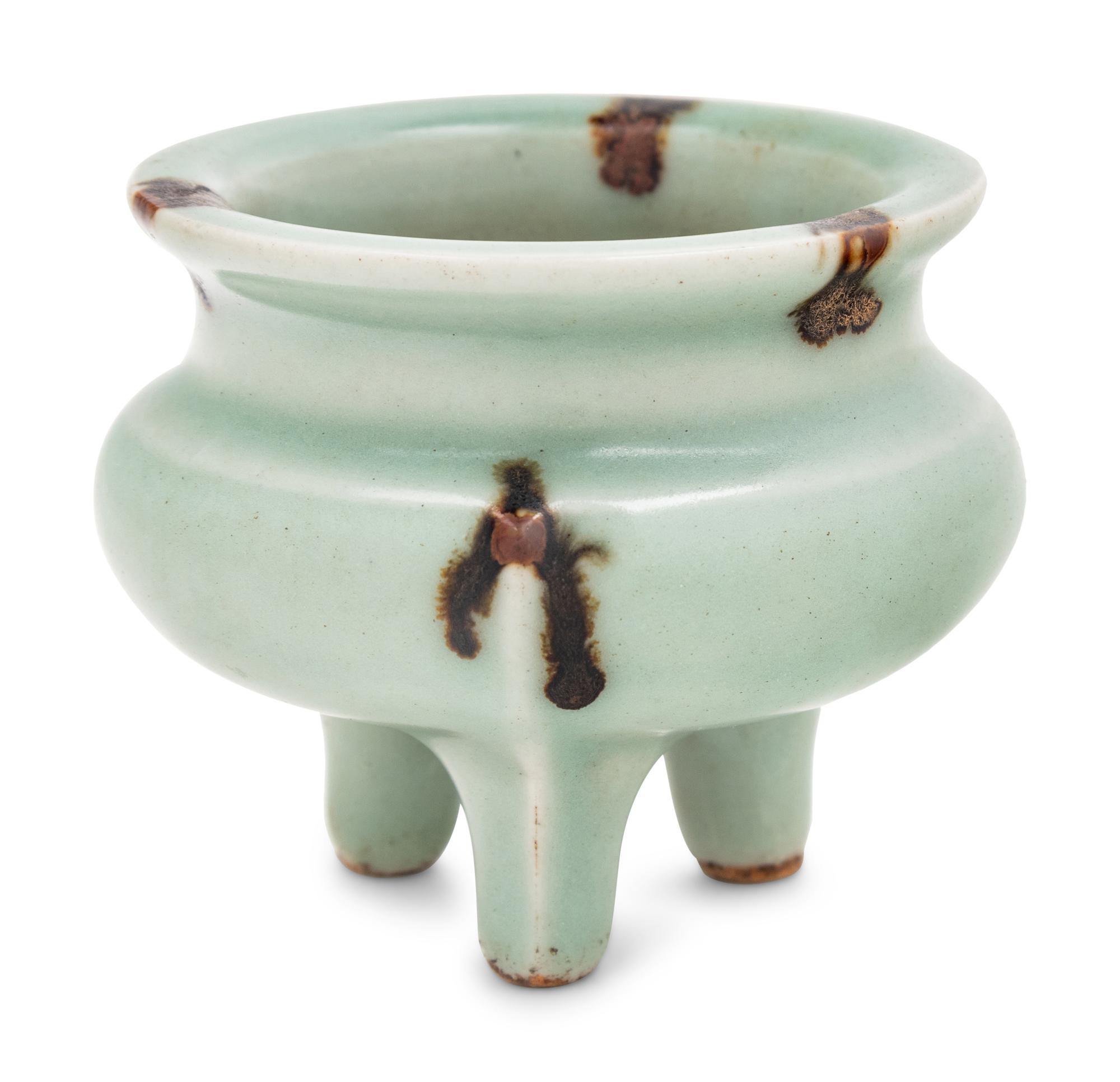 A Chinese Longquan Tobi Seiji Glazed Tripod Incense Burner