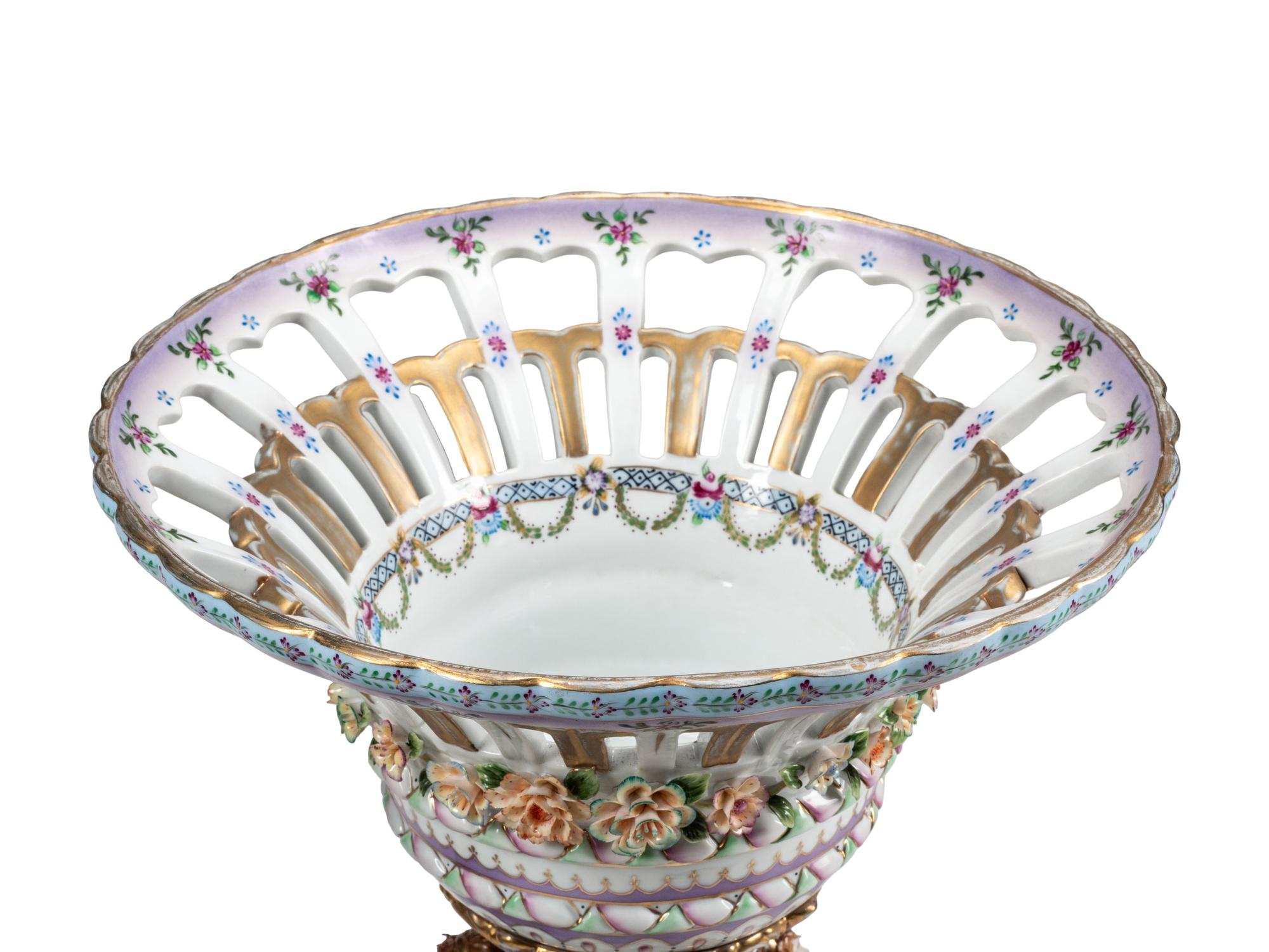 A Pair of German Polychrome Porcelain Centerpiece Baskets