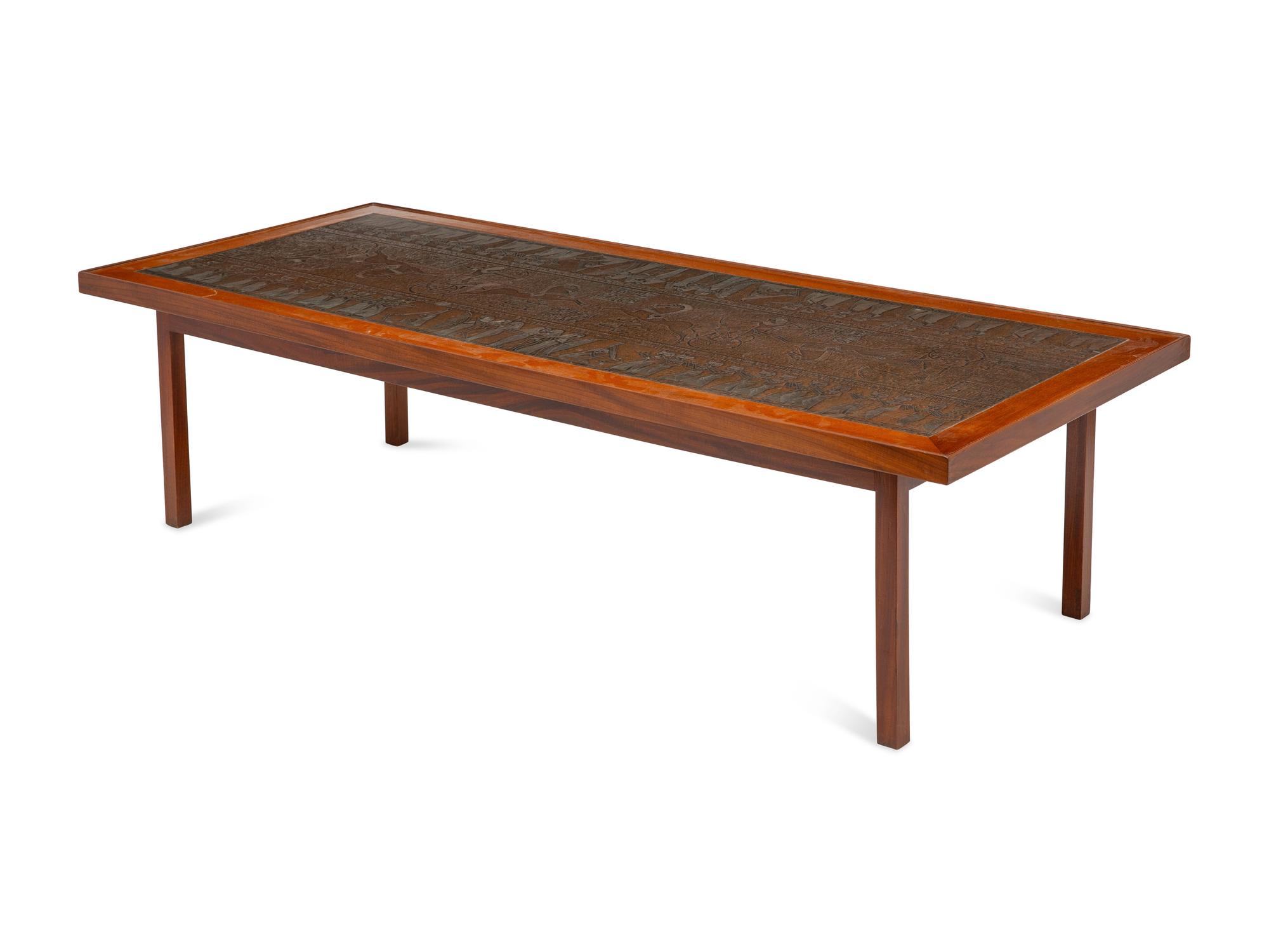 A Scandinavian Modern Teak Low Table with Egyptian Motif Stamped Copper Top