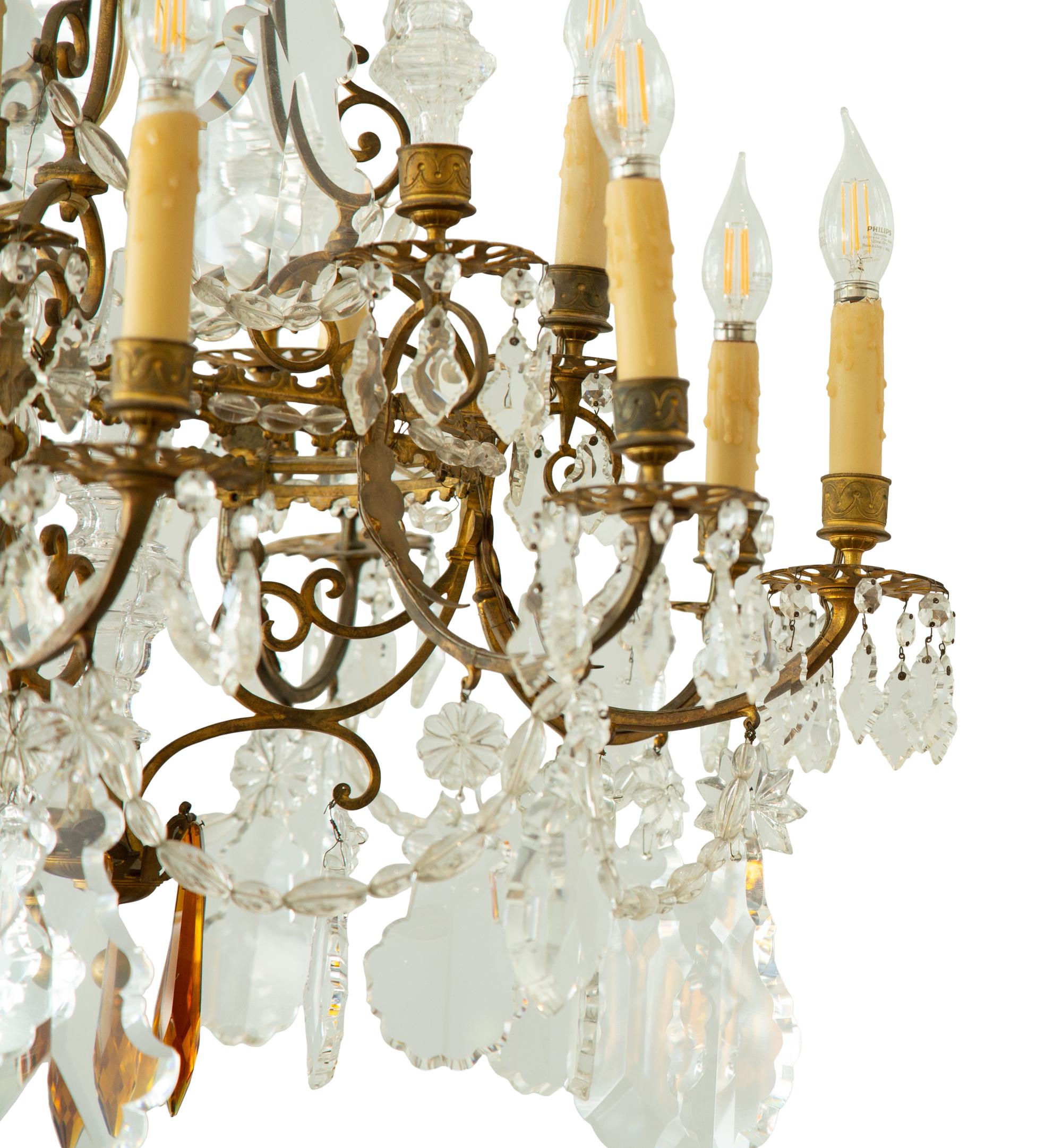 A Louis XV Style Gilt Bronze and Cut Glass Twelve-Light Chandelier