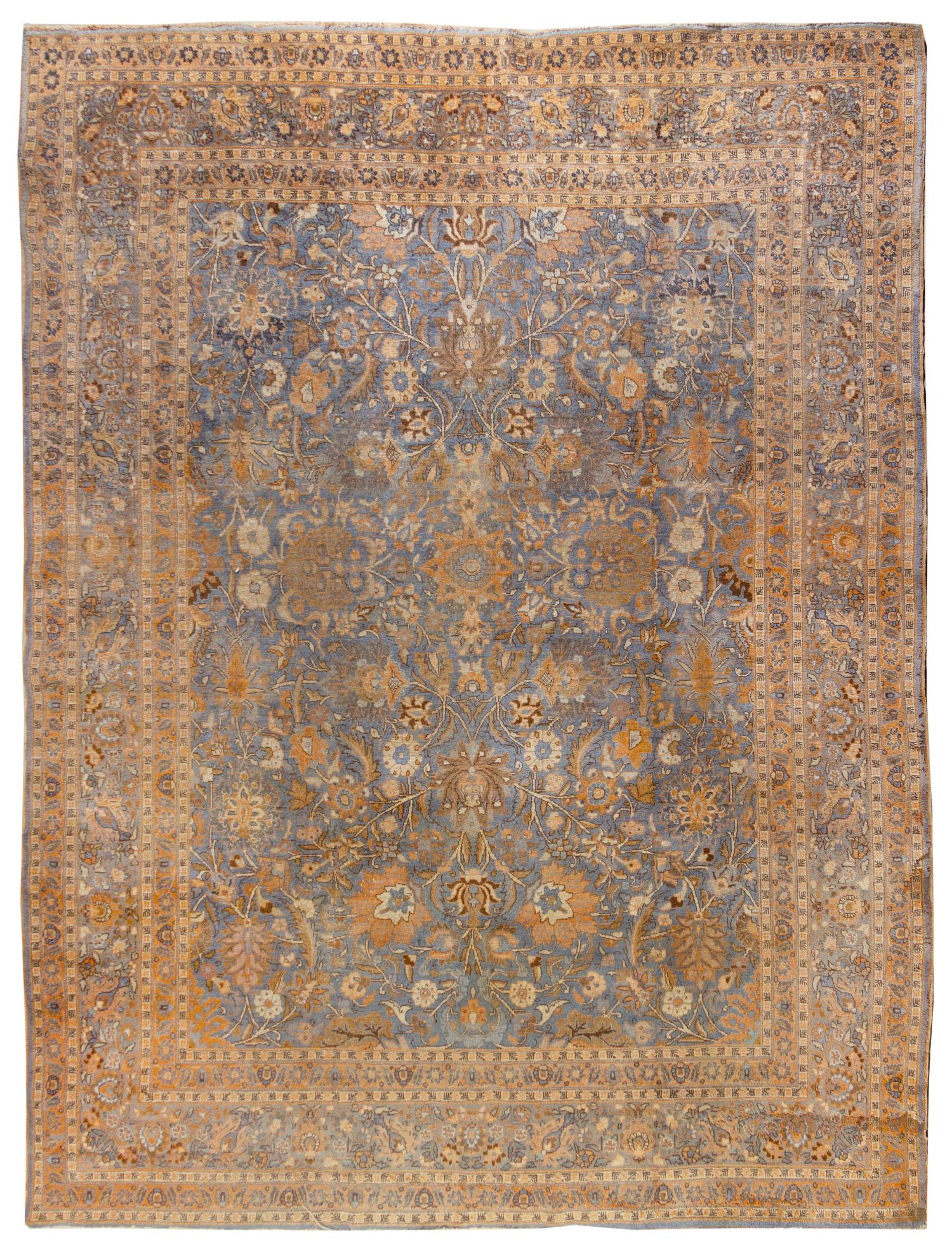 An Indian Wool Rug 10 feet 5 inches x 8 feet 4 inches.