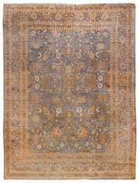 An Indian Wool Rug 10 feet 5 inches x 8 feet 4 inches.