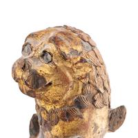 A Pair of Parcel-Gilt and Polychrome Decorated Lion-Form Crest Supporters