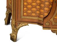A Louis XVI Style Gilt Bronze Mounted Kingwood and Marquetry Marble-Top Commode