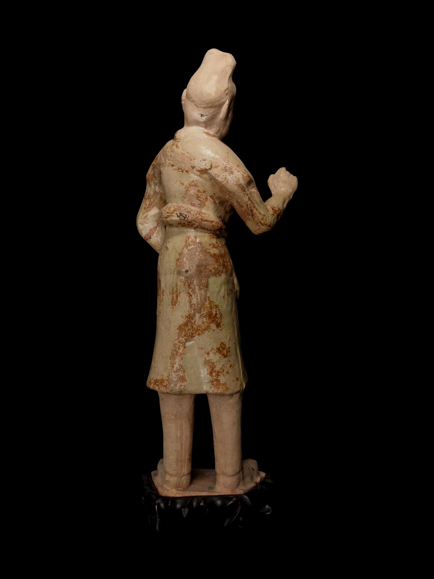 A Sancai Glazed Pottery Figure of a Standing Groom