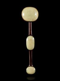 A Pale Celadon Inset Hardwood Ruyi Scepter