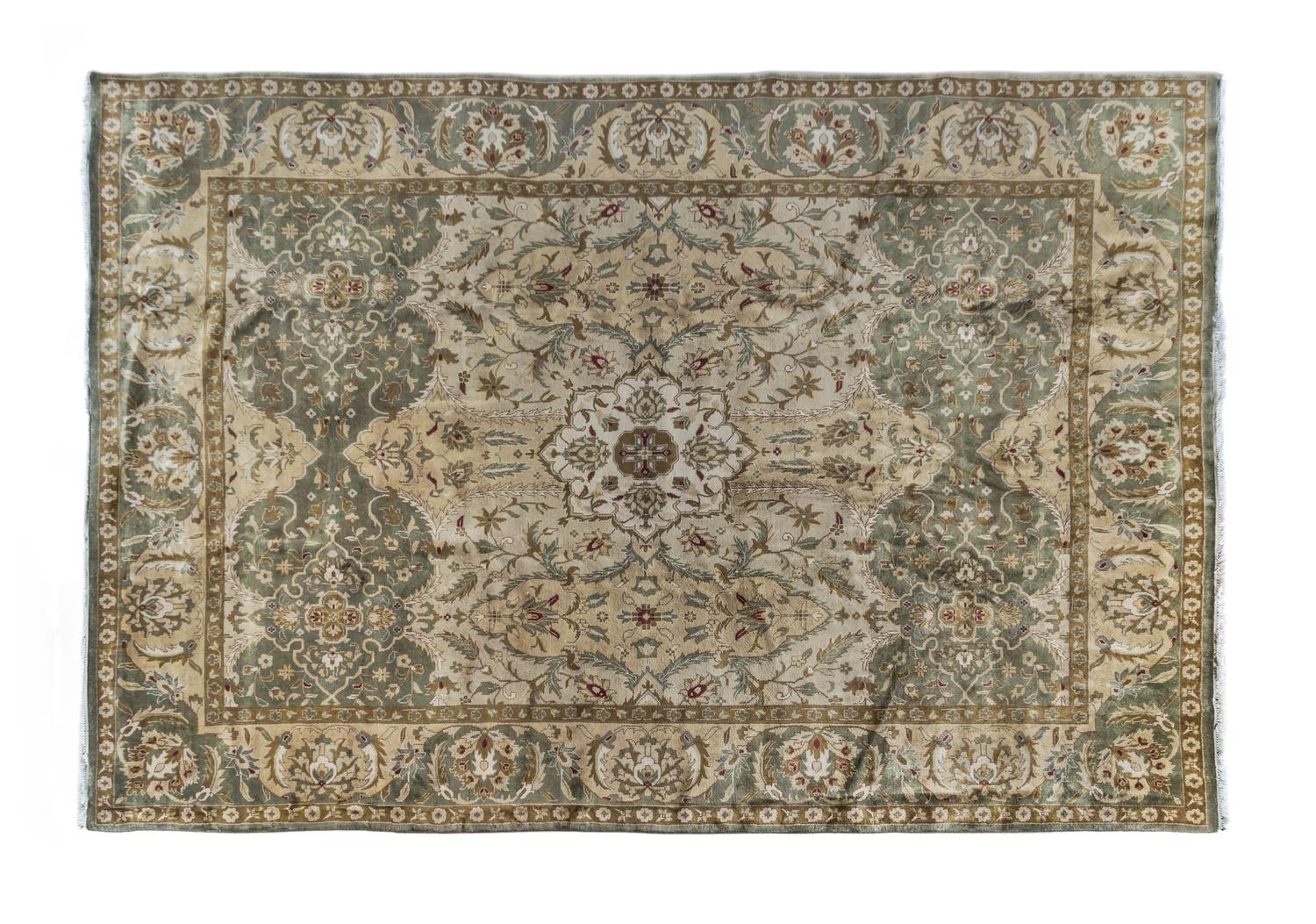 An Indian Wool Rug 13 feet 10 inches x 9 feet 9 inches.