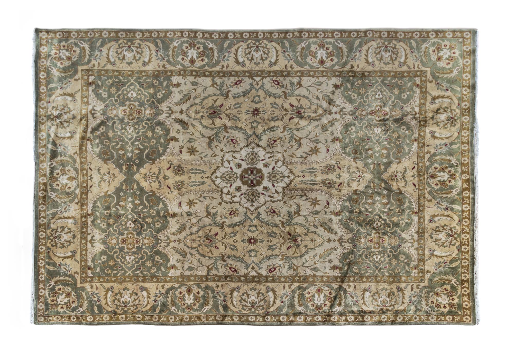 An Indian Wool Rug 13 feet 10 inches x 9 feet 9 inches.