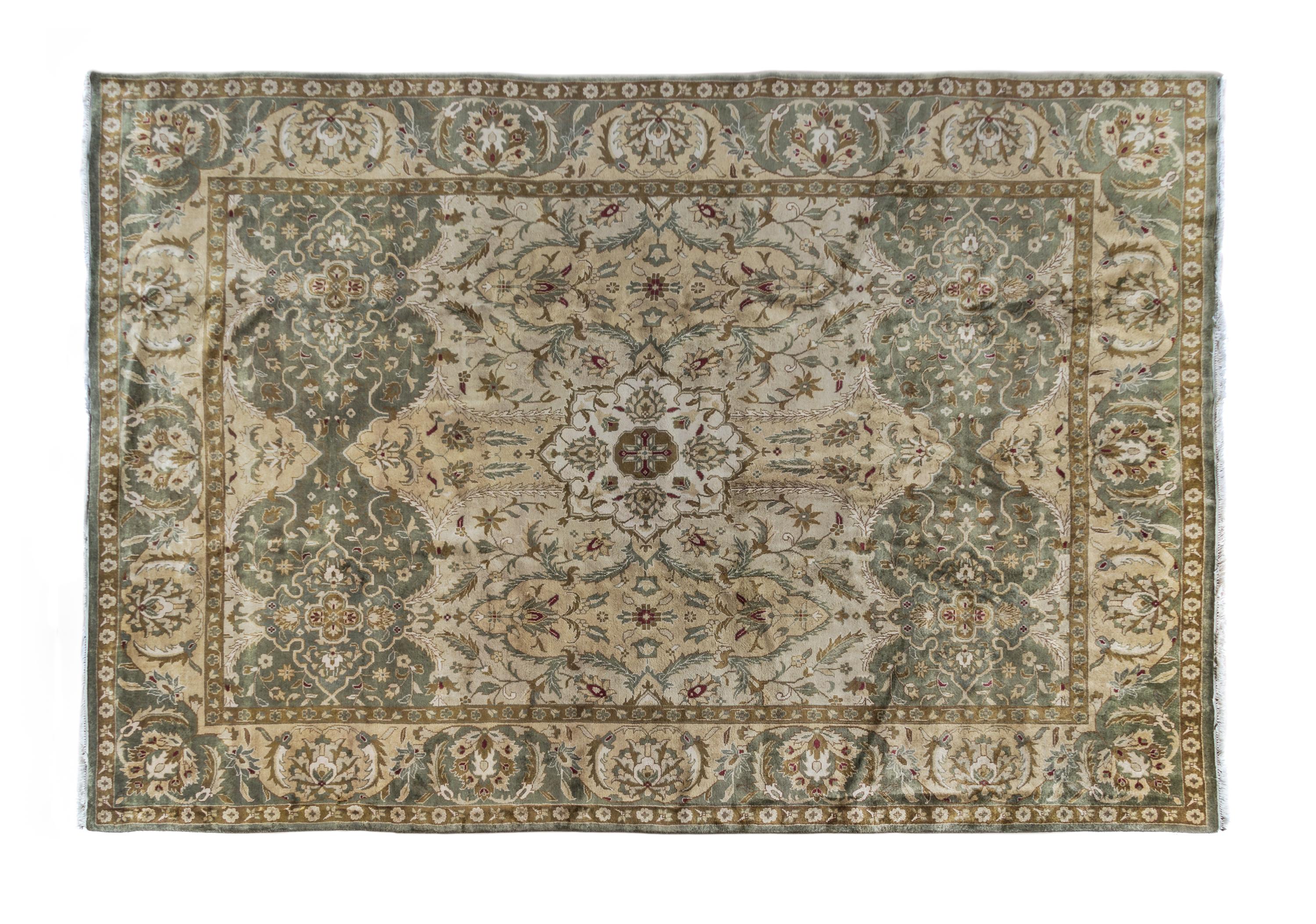 An Indian Wool Rug 13 feet 10 inches x 9 feet 9 inches.