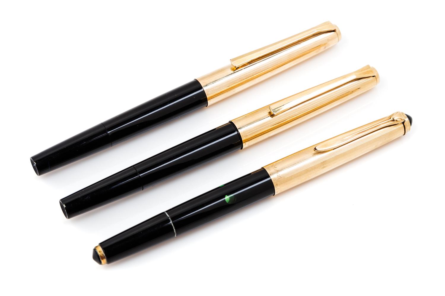 A Collection of Three Vintage Pelikan Fountain Pens Length of each 5 1/8 inches.