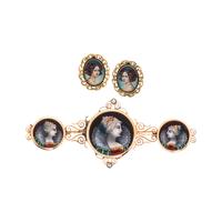 COLLECTION OF YELLOW GOLD AND PORTRAIT JEWELRY