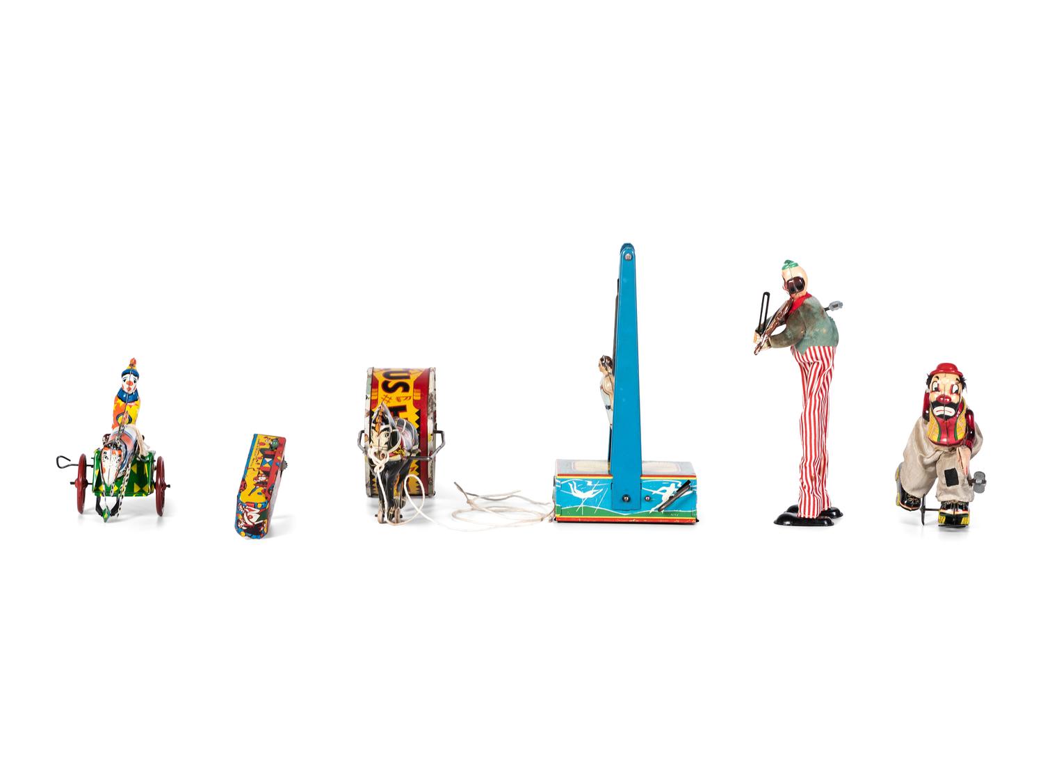 Six Tin Clown and Circus Toys