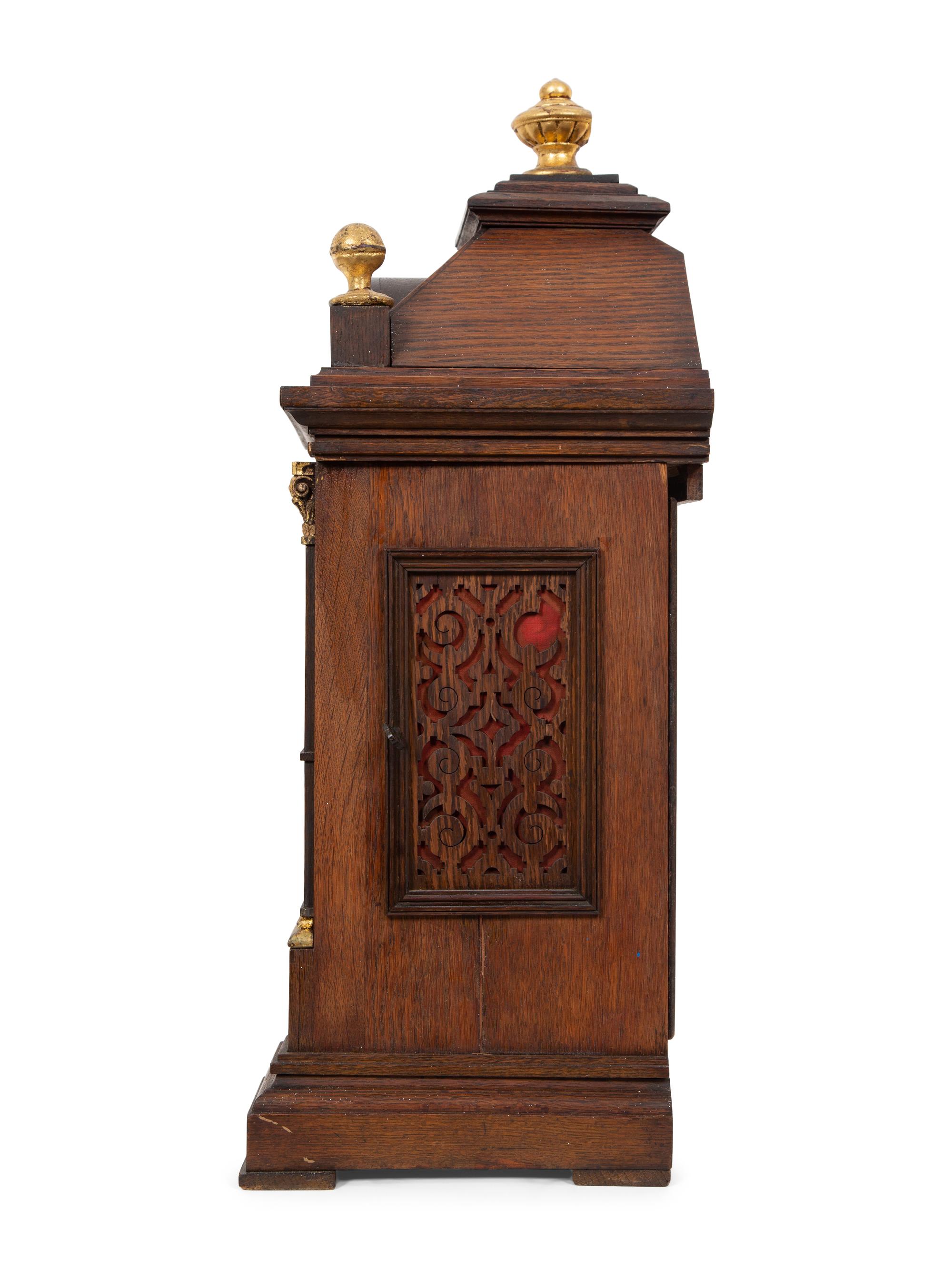 A Victorian Gilt Metal Mounted Oak Bracket Clock