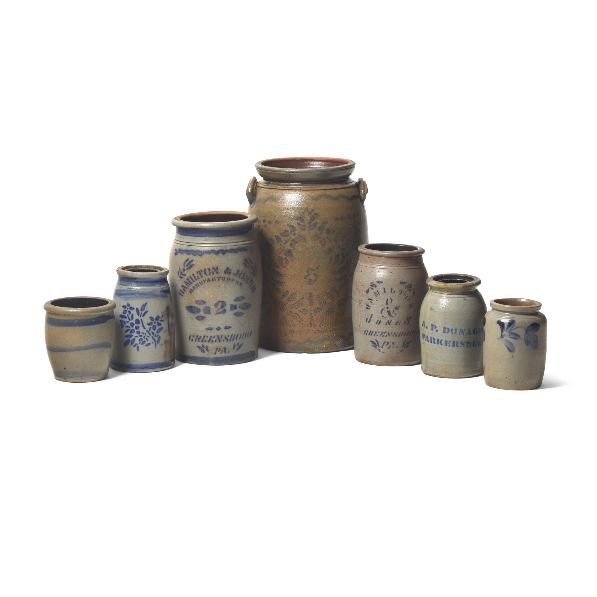 Seven Cobalt-Decorated and Stenciled Stoneware Jars