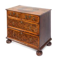 A William and Mary Oysterwood and Figured Walnut Chest of Drawers