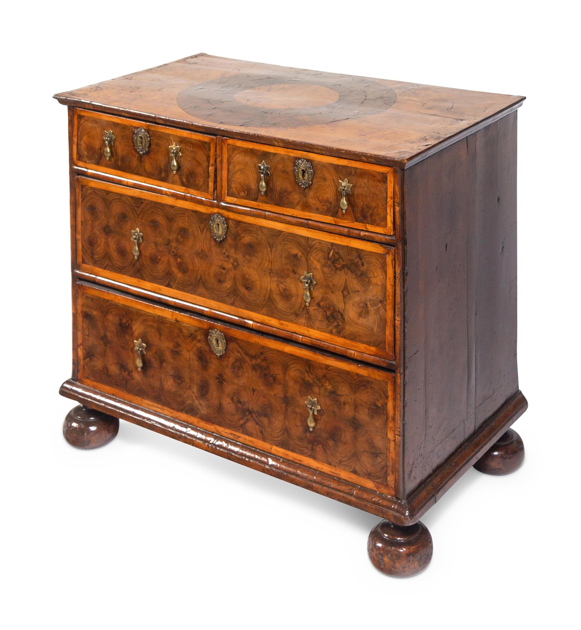 A William and Mary Oysterwood and Figured Walnut Chest of Drawers