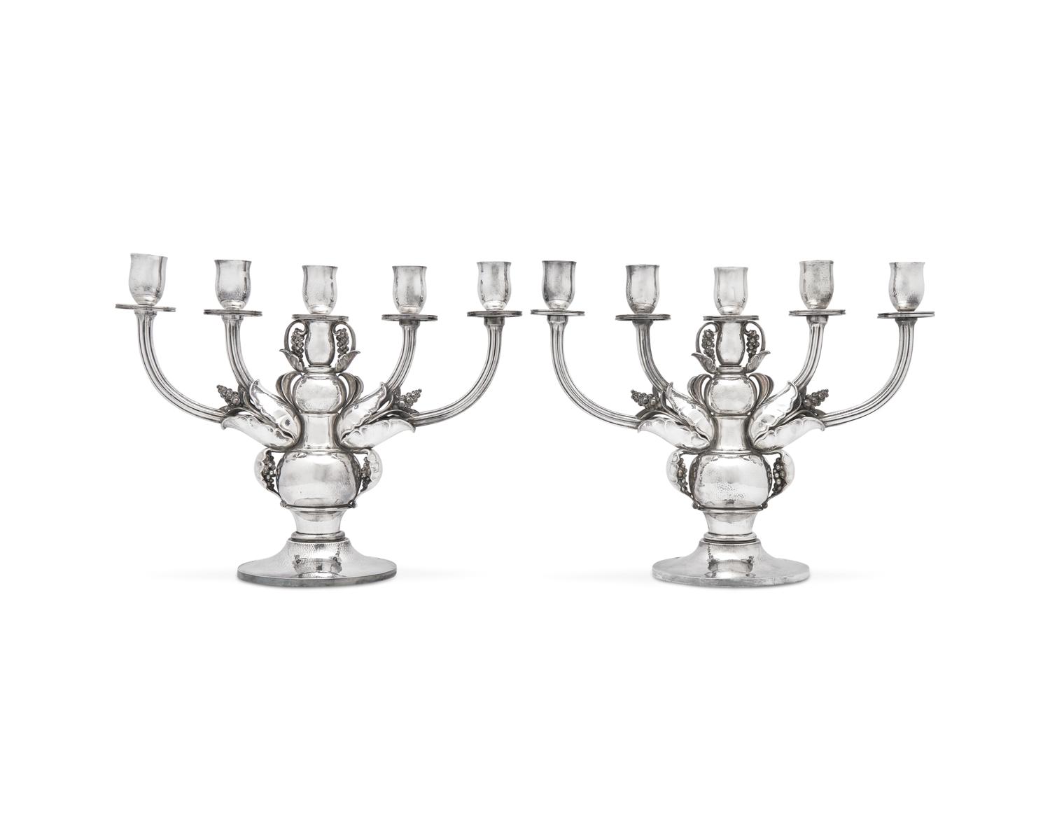 A Pair of Georg Jensen Designed Silver Five-Light Candelabra