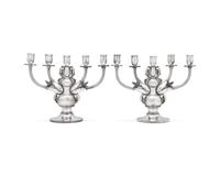 A Pair of Georg Jensen Designed Silver Five-Light Candelabra