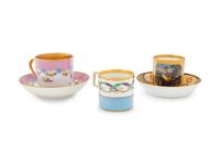 Two Vienna Painted and Parcel Gilt Porcelain Teacup and Saucer Sets and an Additional Vienna Porcelain Teacup
