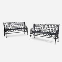 A pair of Gothic Revival black-painted cast iron garden benches 20th century