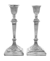 A Pair of Victorian Silver Candlesticks, James Kebberling Bembridge, Sheffield, 1880, each having a fluted urn form candle cup above a