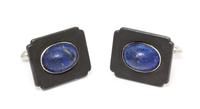 A Pair of Art Moderne Blackened Steel, White Gold and Lapis Lazuli Cufflinks, Marsh & Co., 11.25 dwts.