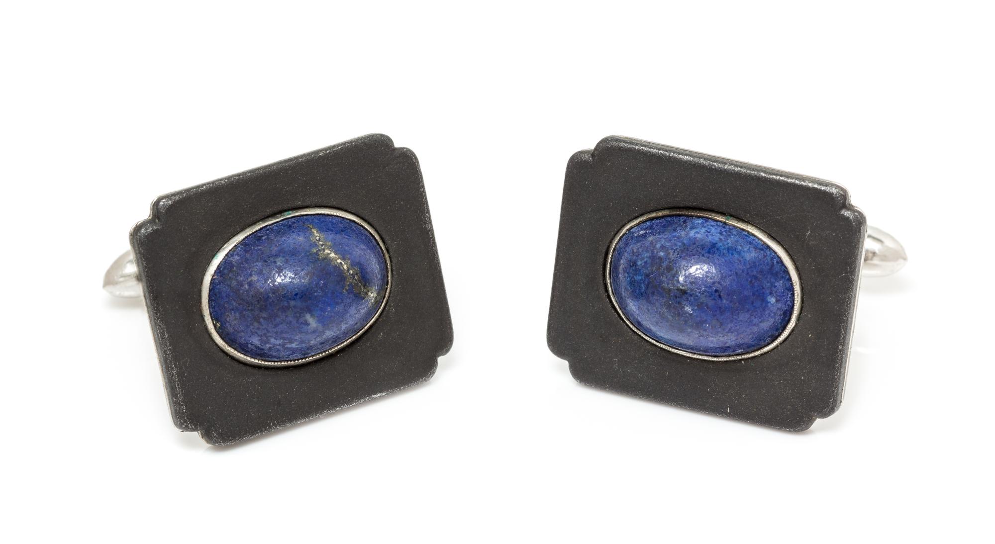 A Pair of Art Moderne Blackened Steel, White Gold and Lapis Lazuli Cufflinks, Marsh & Co., 11.25 dwts.