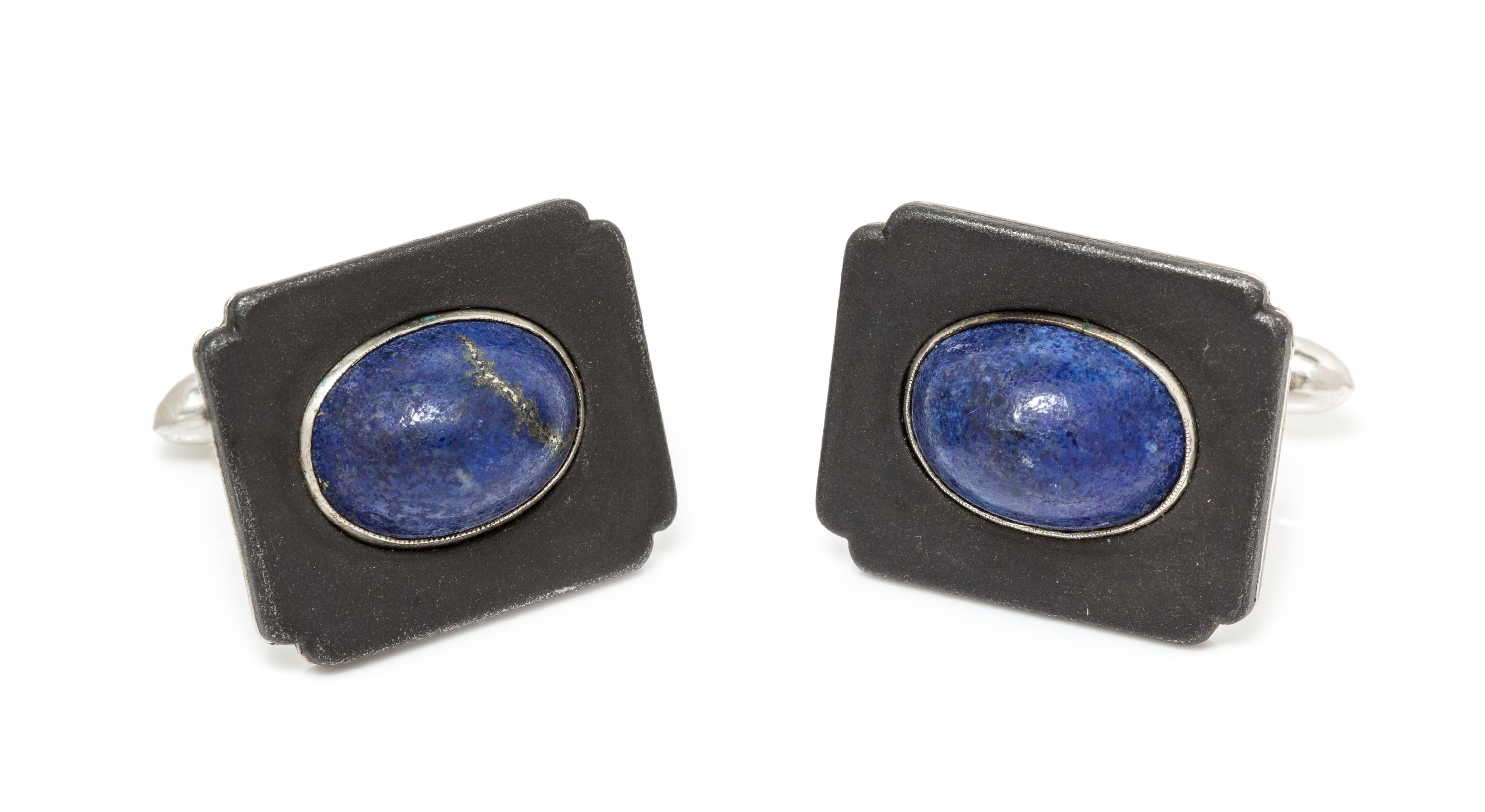 A Pair of Art Moderne Blackened Steel, White Gold and Lapis Lazuli Cufflinks, Marsh & Co., 11.25 dwts.