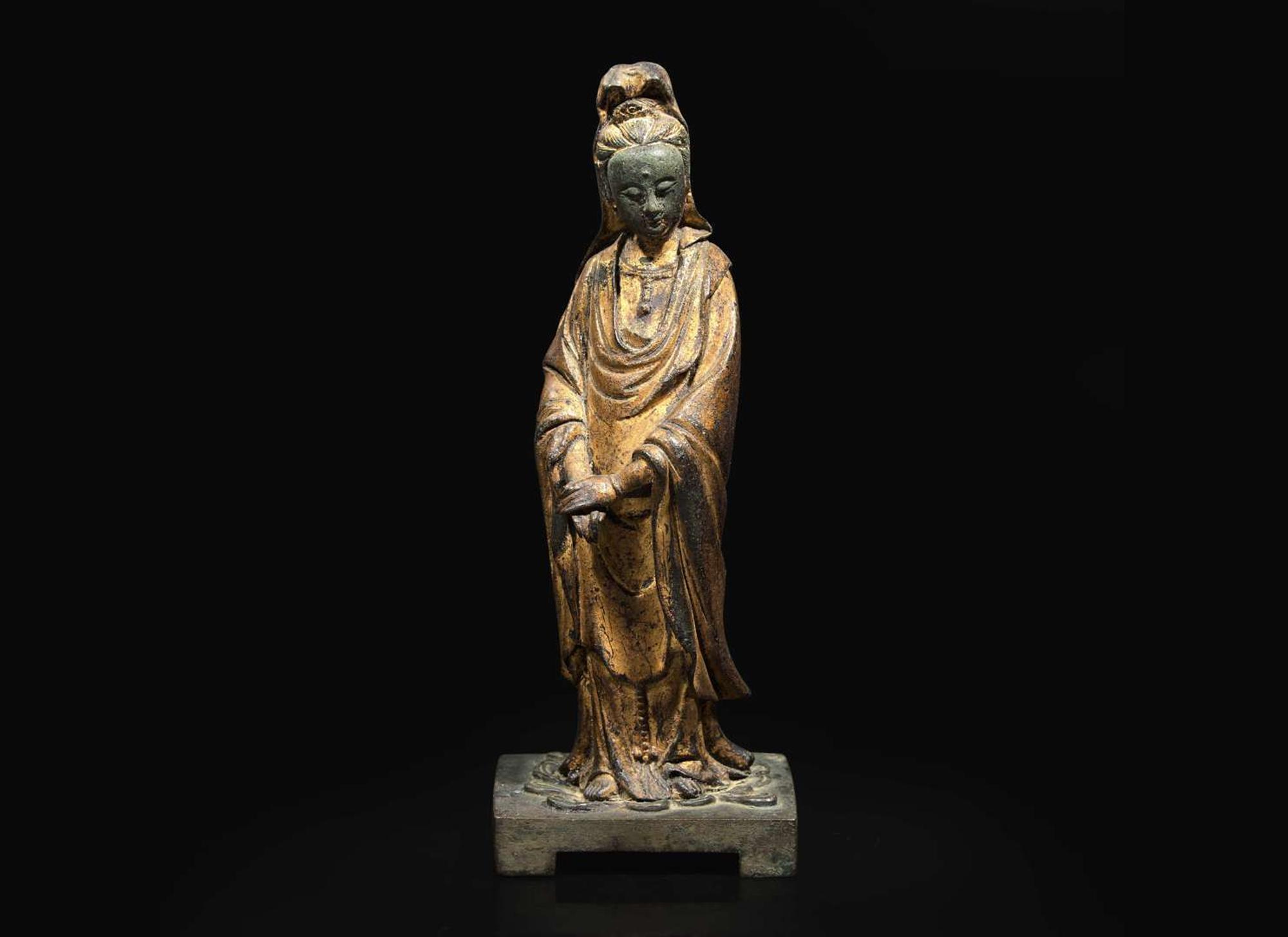 A Chinese gilt-lacquered bronze figure of Guanyin, 17th / 18th century 漆金銅觀音 十七或十八世紀