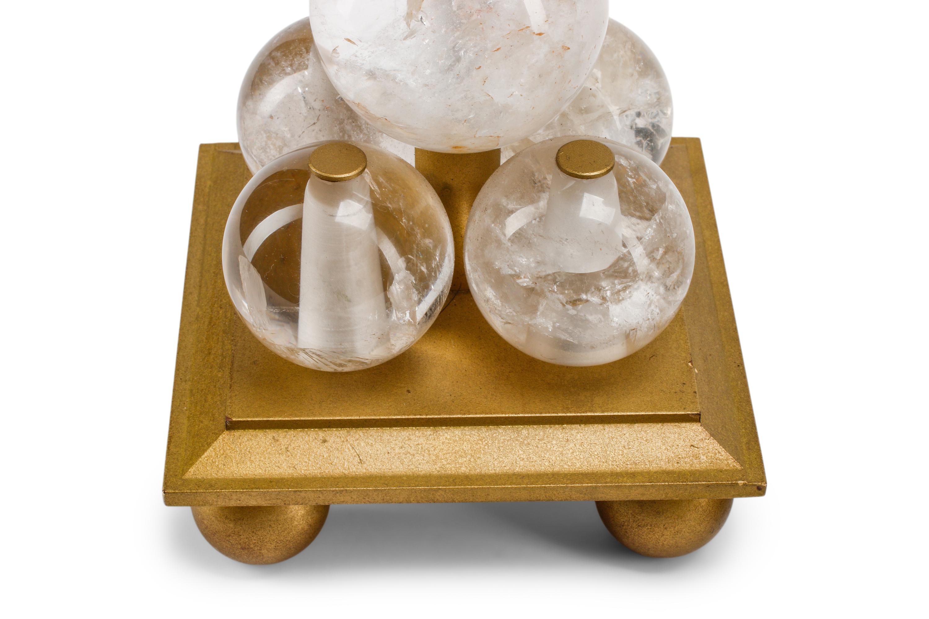 A Pair of Gilt Bronze and Rock Crystal Cannon-Motif Candlesticks