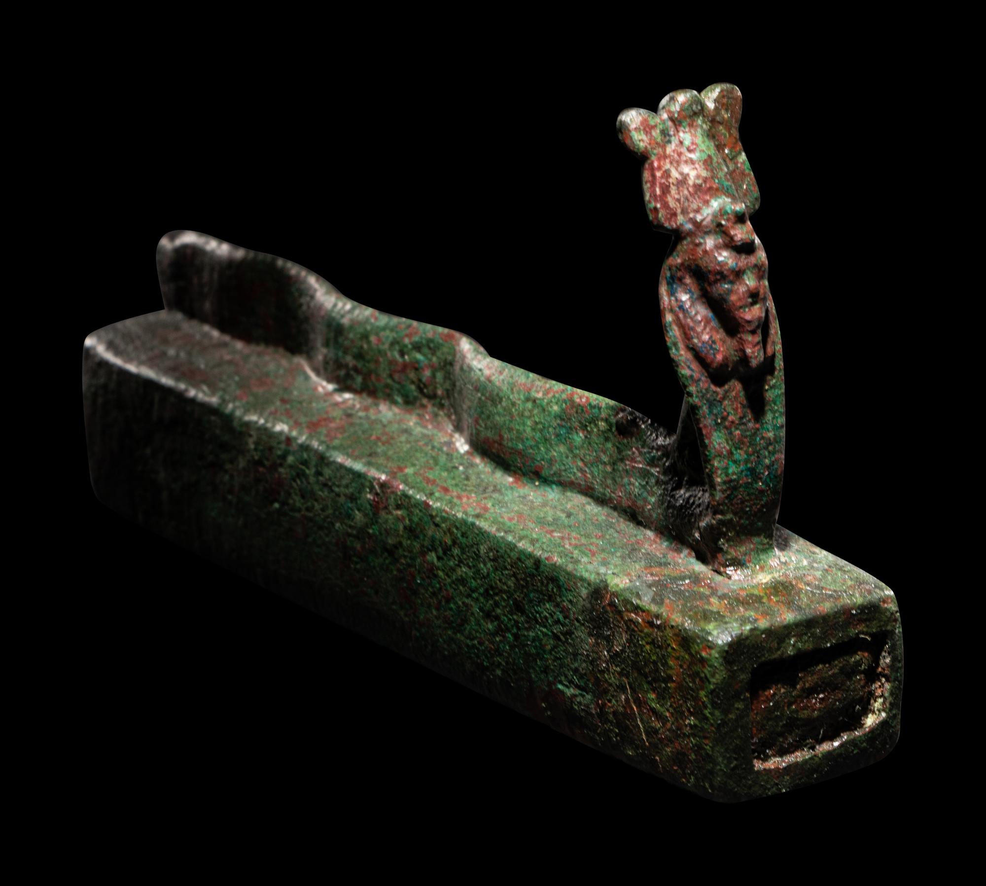 An Egyptian Bronze Snake Coffin