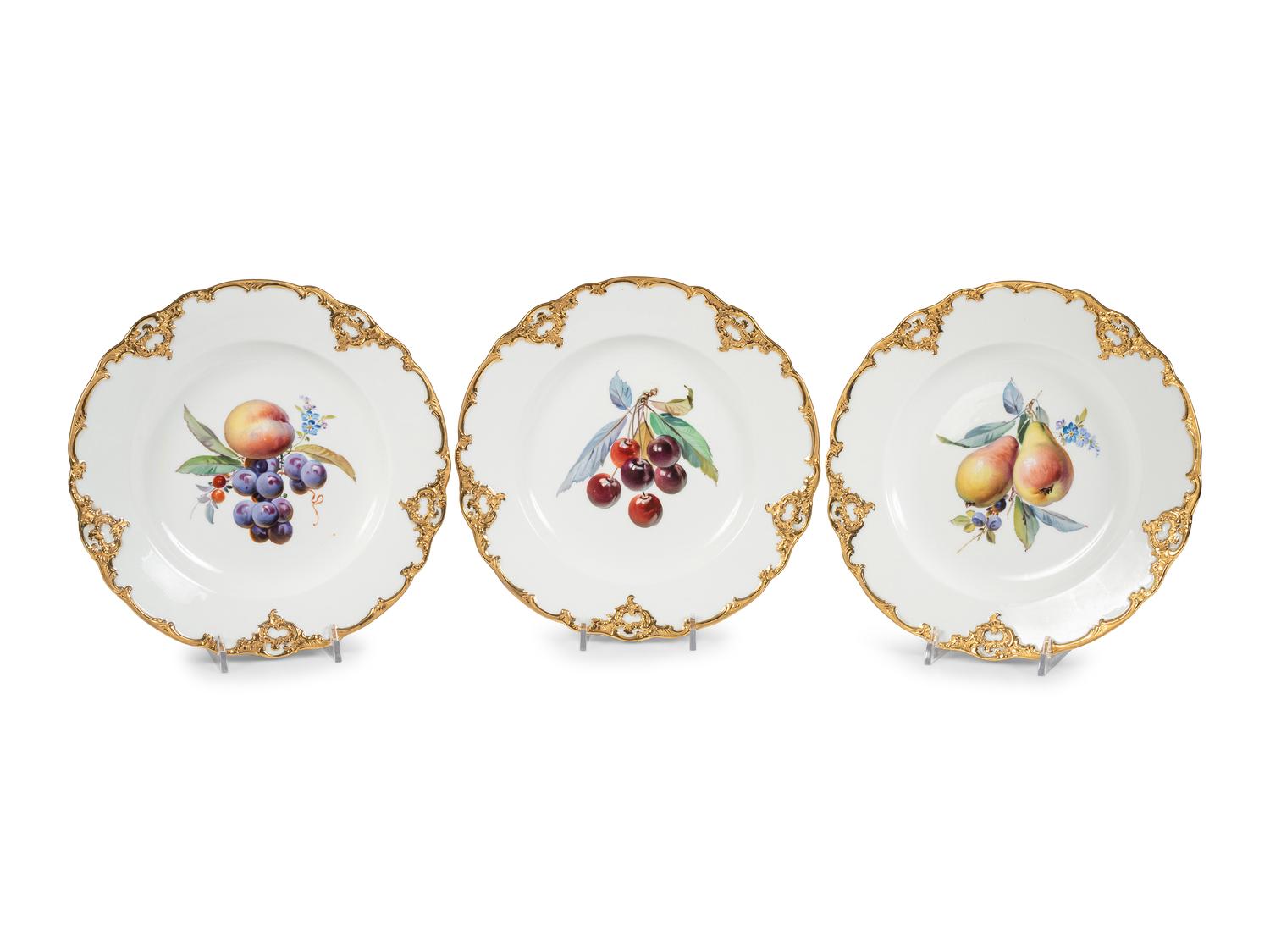 Three Meissen Porcelain Parcel Gilt and Hand Painted Fruit Plates