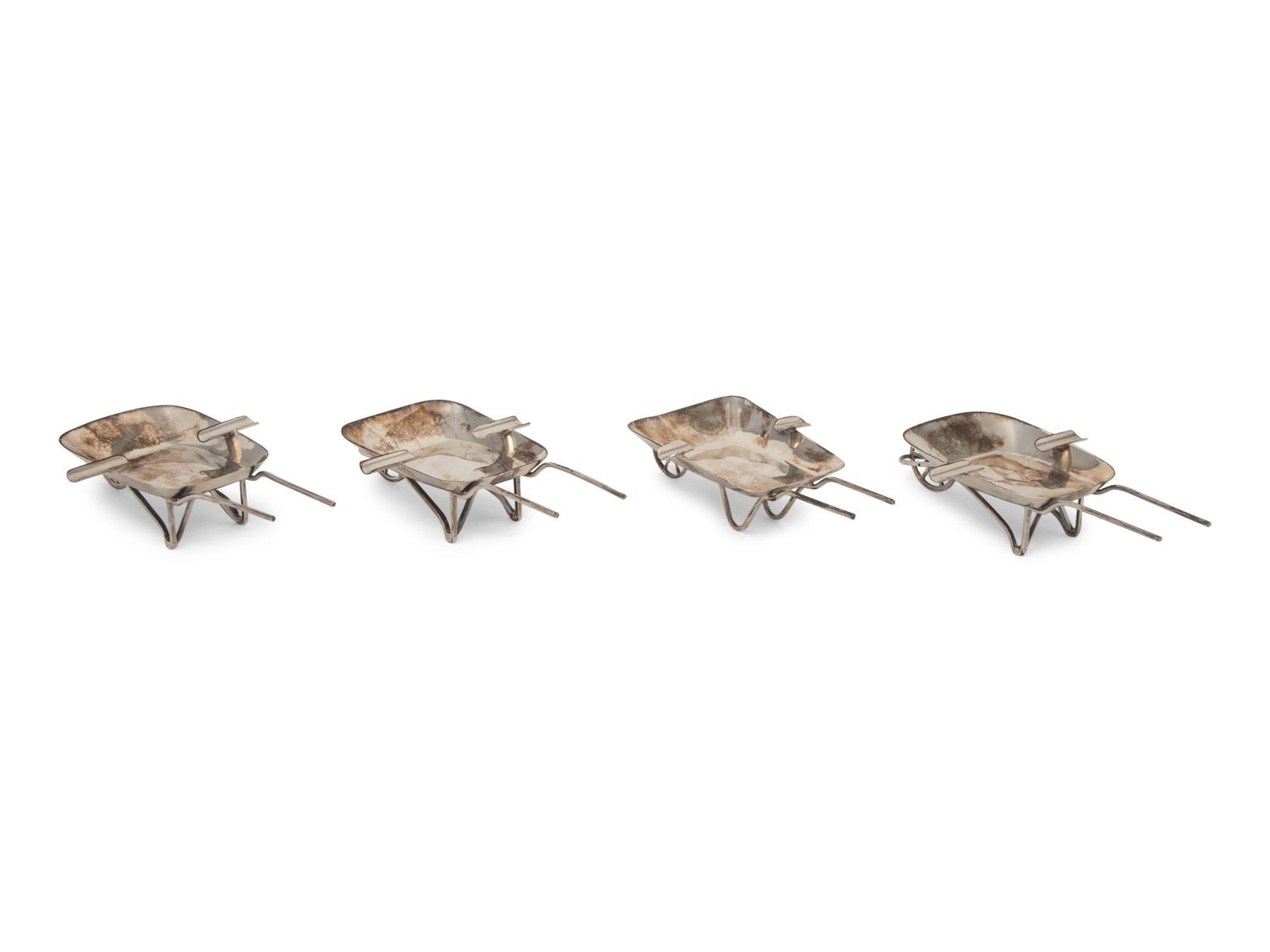 An Assembled Set of Four Mexican Silver Wheelbarrow-Form Ash Trays