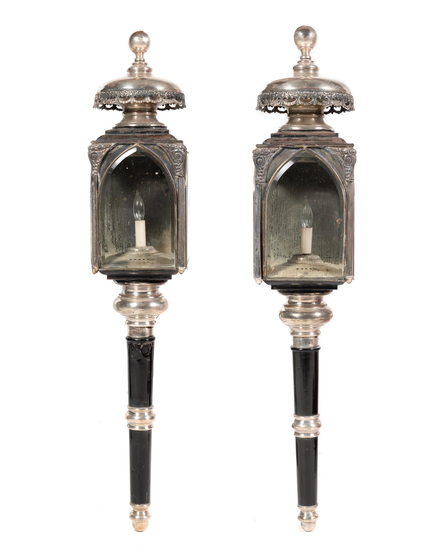 A Pair of Black-Painted and Silvered Metal Mounted Lanterns