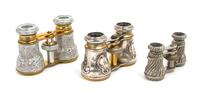 Three Pairs of Continental Silver or Silvered Metal Mounted Opera Glasses, Width of widest 4 1/4 inches.