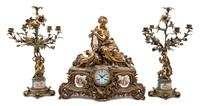 A Louis XV Style Gilt Metal and Sevres Style Porcelain Garniture Height of candelabra 26 1/2 inches. — 19TH CENTURY