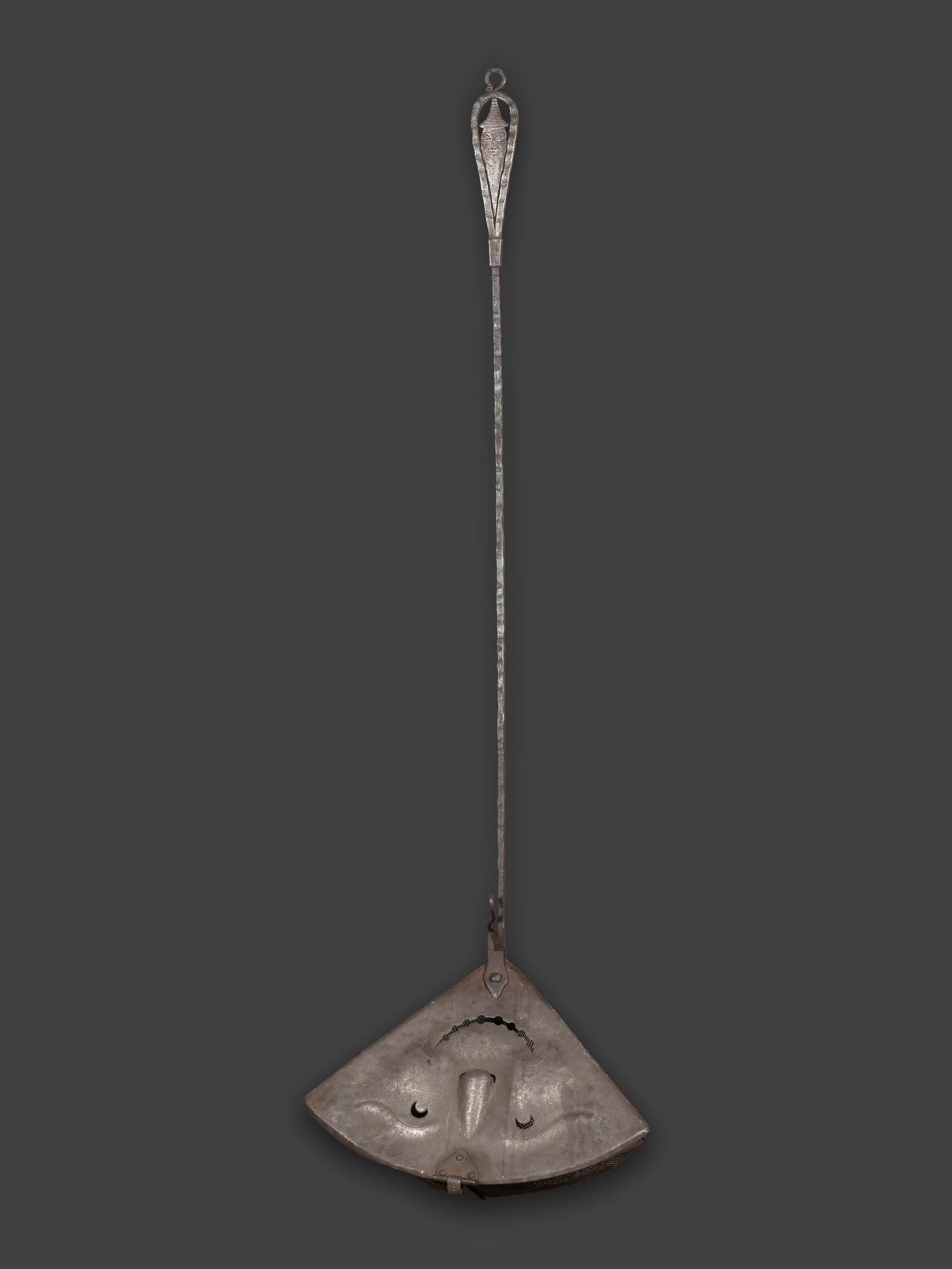 A Forged and Hammered Iron Figural Chestnut Roaster