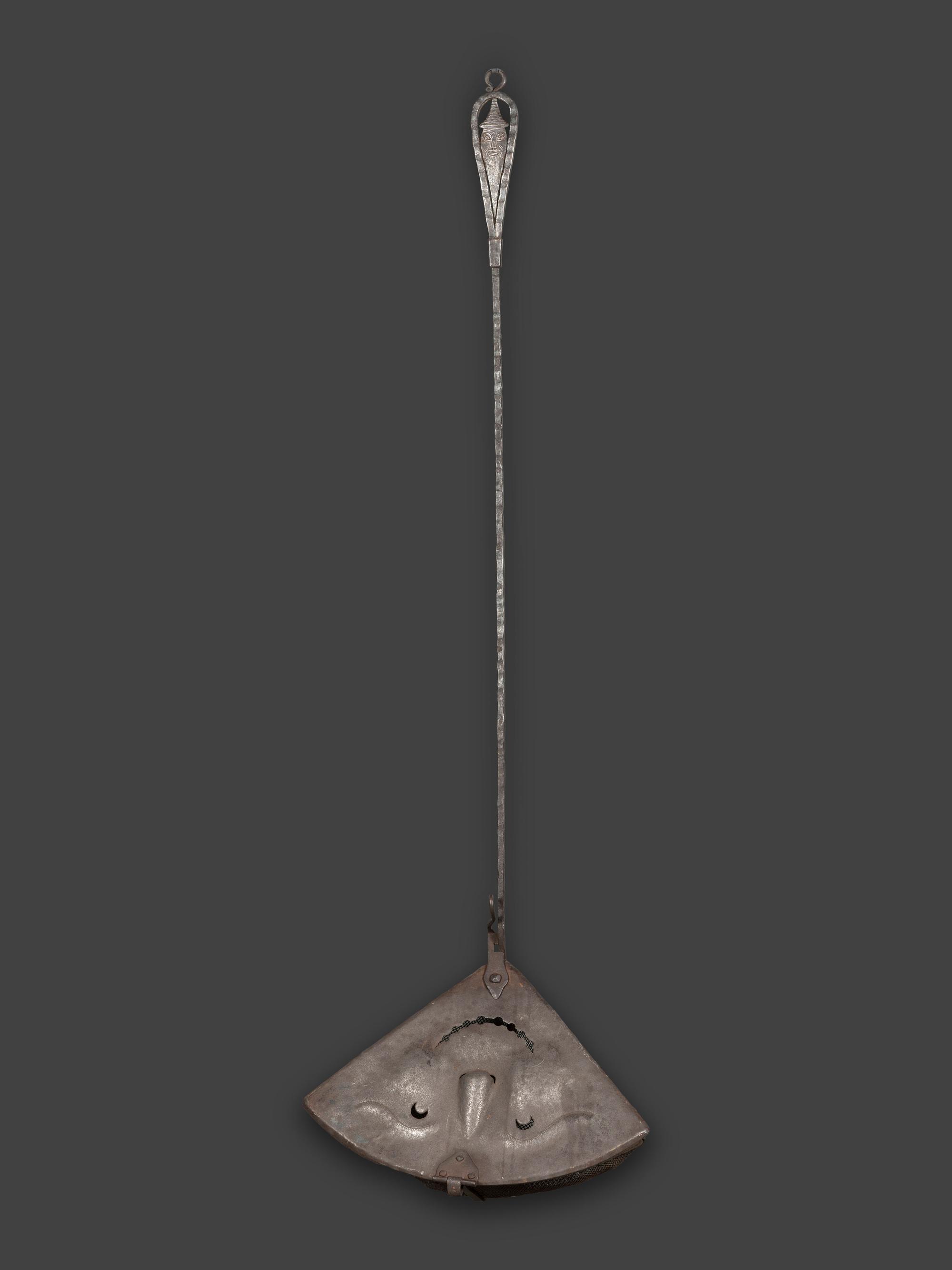 A Forged and Hammered Iron Figural Chestnut Roaster