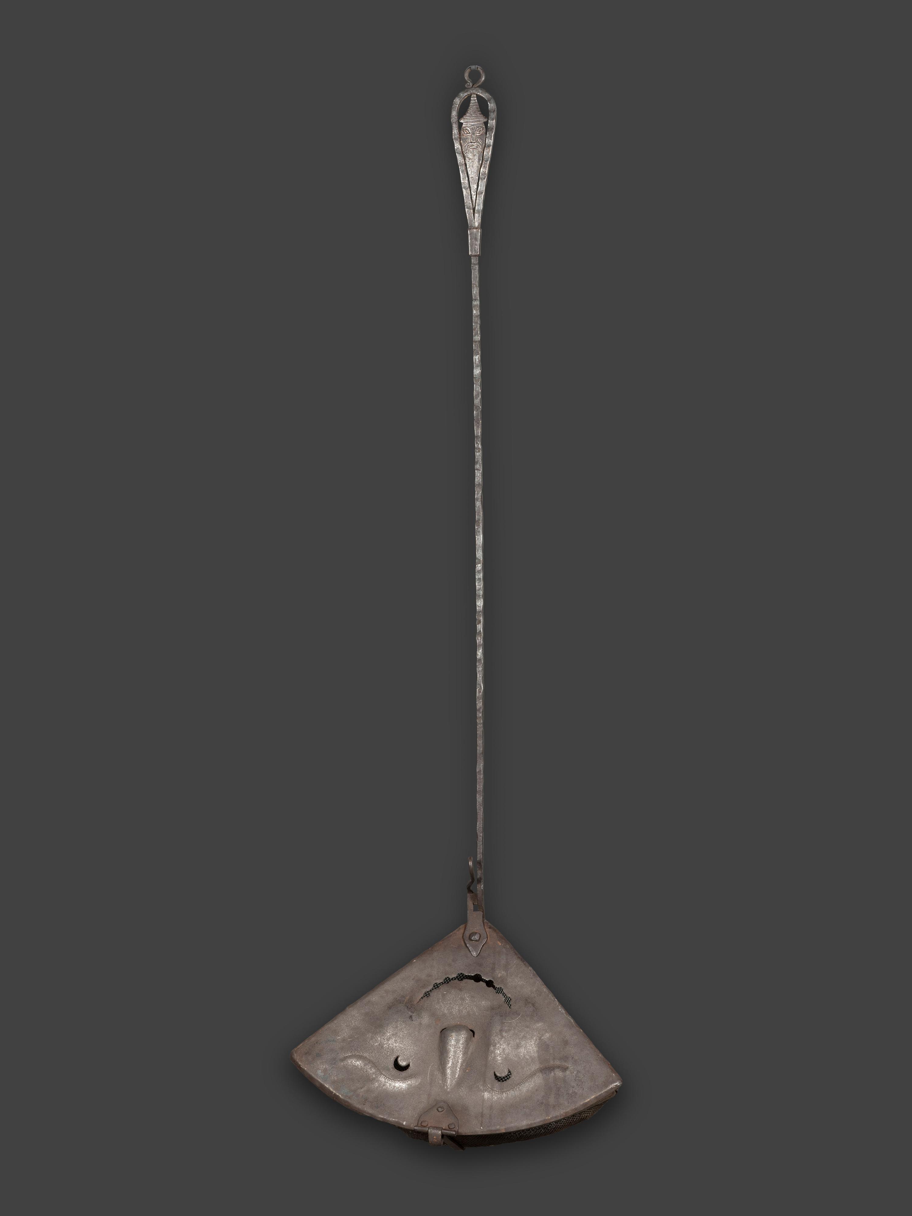 A Forged and Hammered Iron Figural Chestnut Roaster
