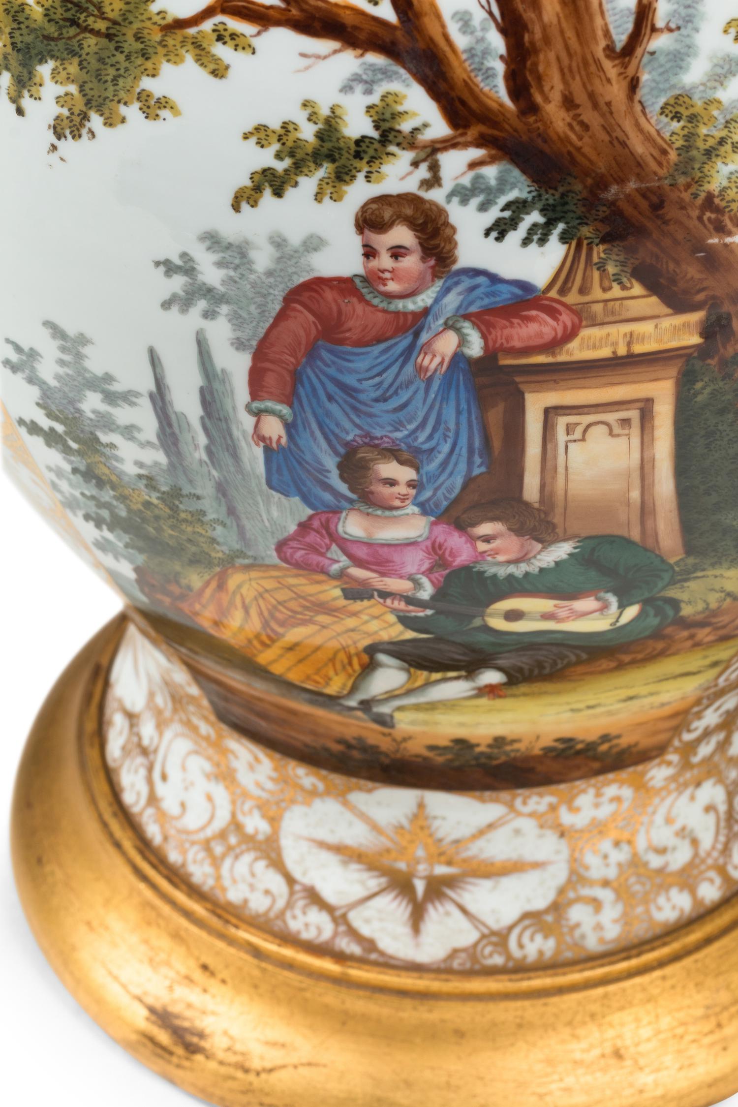A Pair of German Porcelain Urns Mounted as Lamps