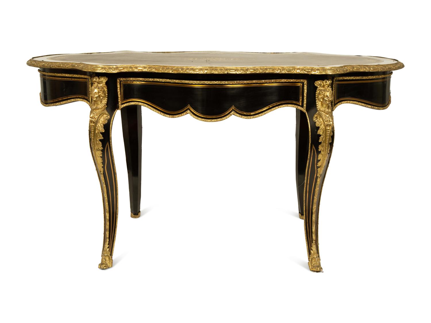 A Napoleon III Style Gilt Bronze Mounted Ebonized Writing Table — LATE 19TH CENTURY