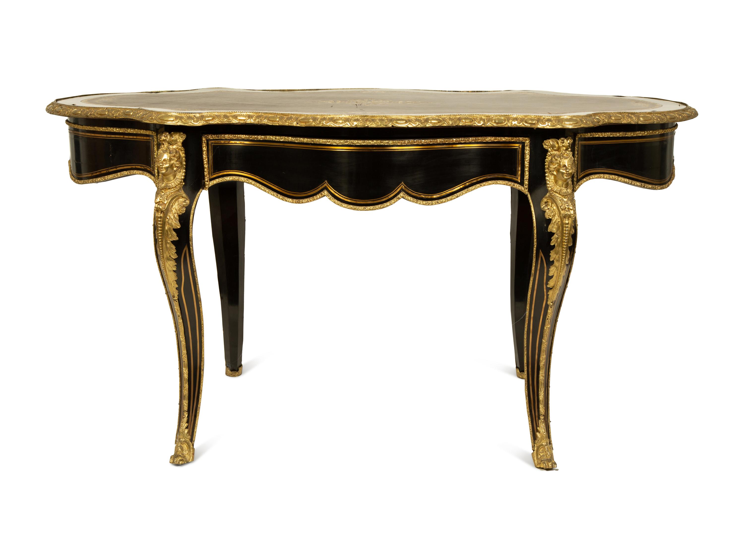 A Napoleon III Style Gilt Bronze Mounted Ebonized Writing Table — LATE 19TH CENTURY