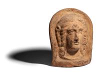 An Etruscan Terracotta Votive Head of a Woman