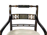 A Set of Four Regency Style Painted and Parcel Gilt Armchairs